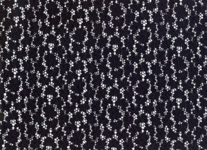 Uni-elastische Spitzenbreitware schwarz Blumenkettenmuster, 130cm breit.