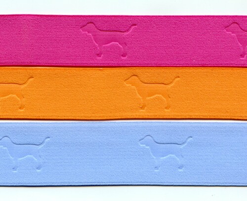 Bundband mit eingewebten Hundesymbolen in verschiedenen Farben und Breiten
