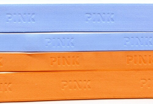 Bundband mit einem eingewebtem Symbol "PINK"